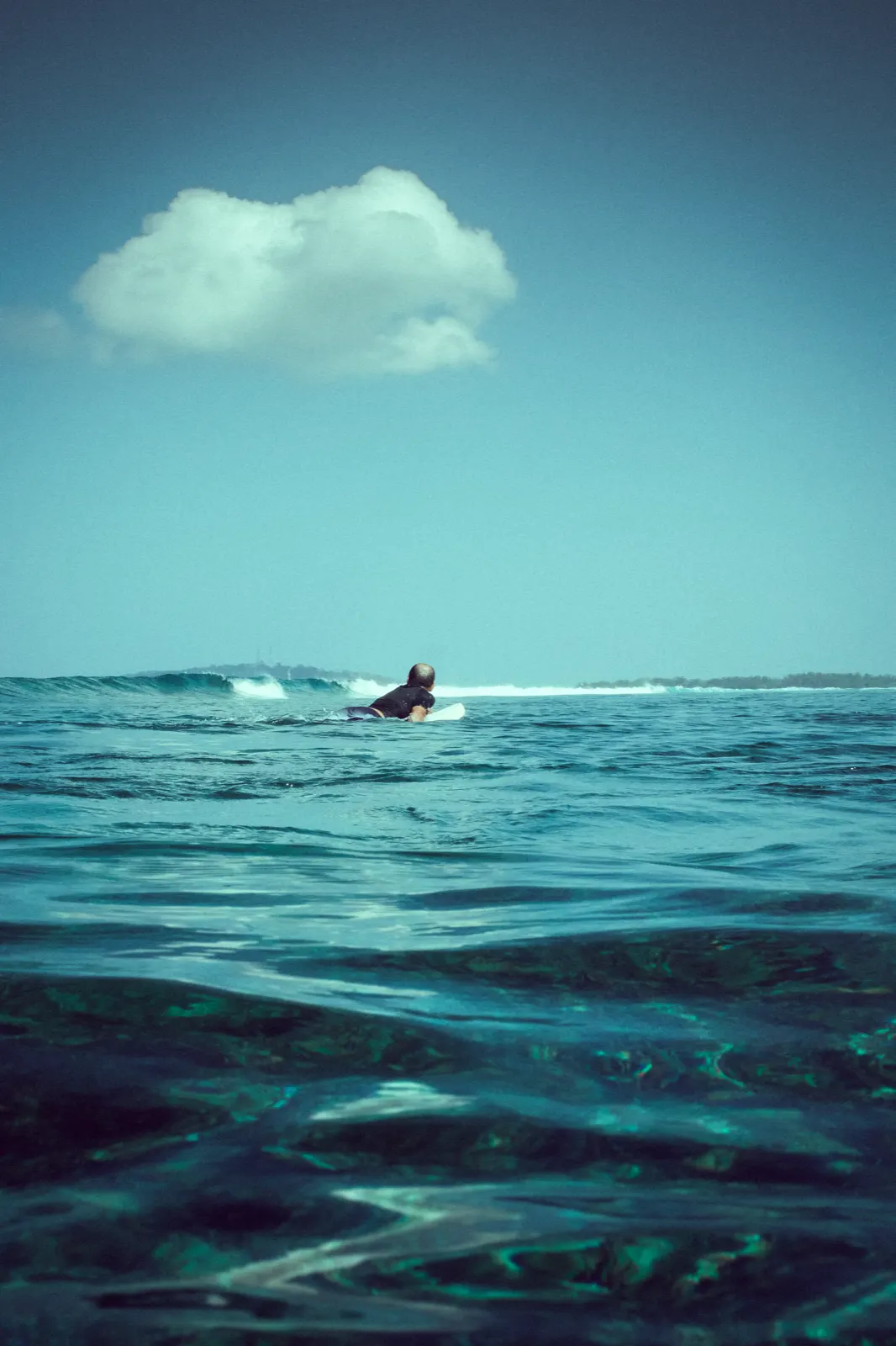 Surfing the reef near Gili Air 4
